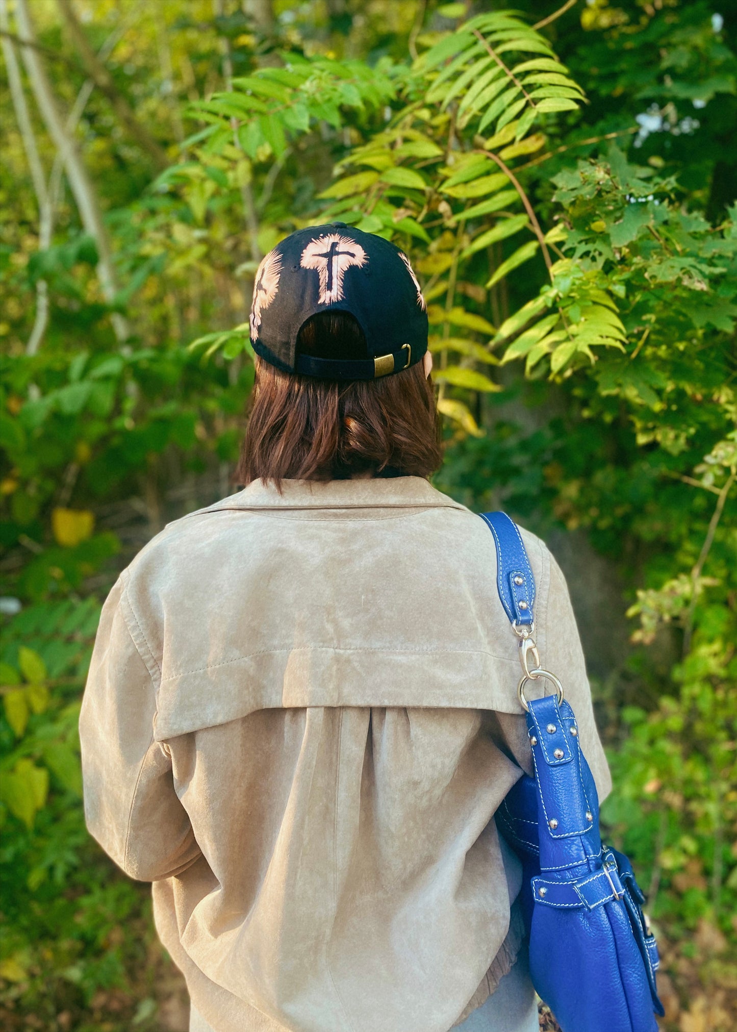 “Death has come alive” hat