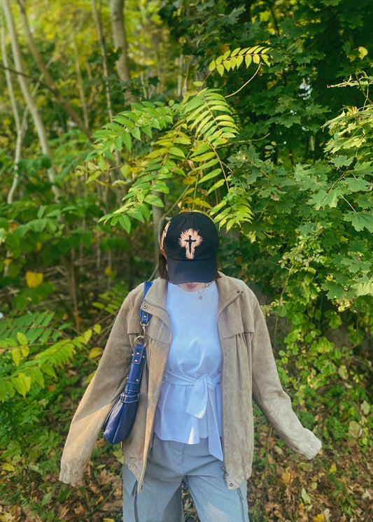 “Death has come alive” hat