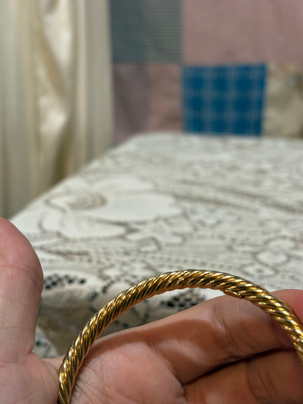 Vintage gold tone twist bangle