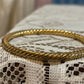 Vintage gold tone twist bangle