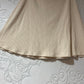 Tan Reformation skirt