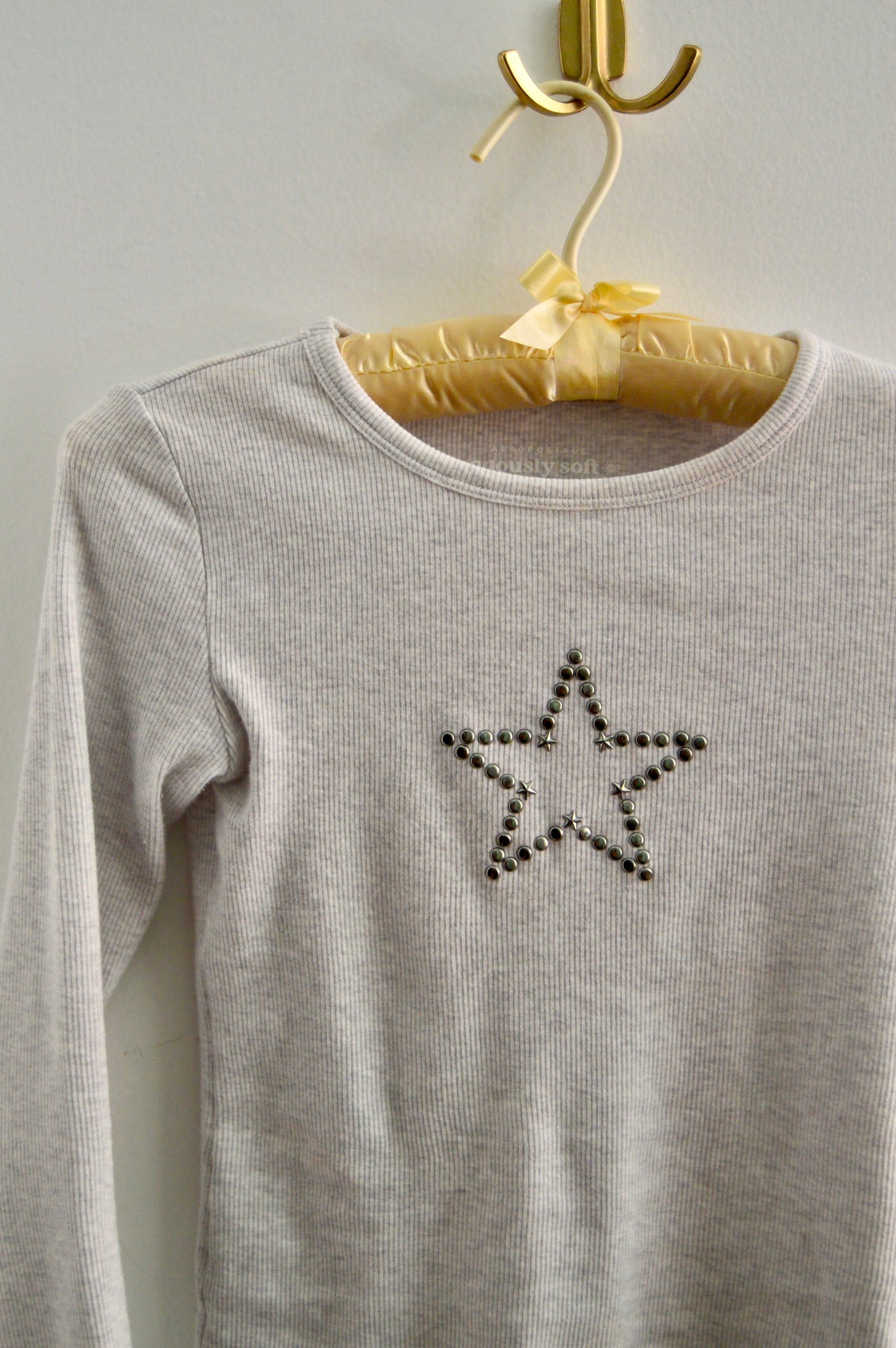 Aero studded star baby tee